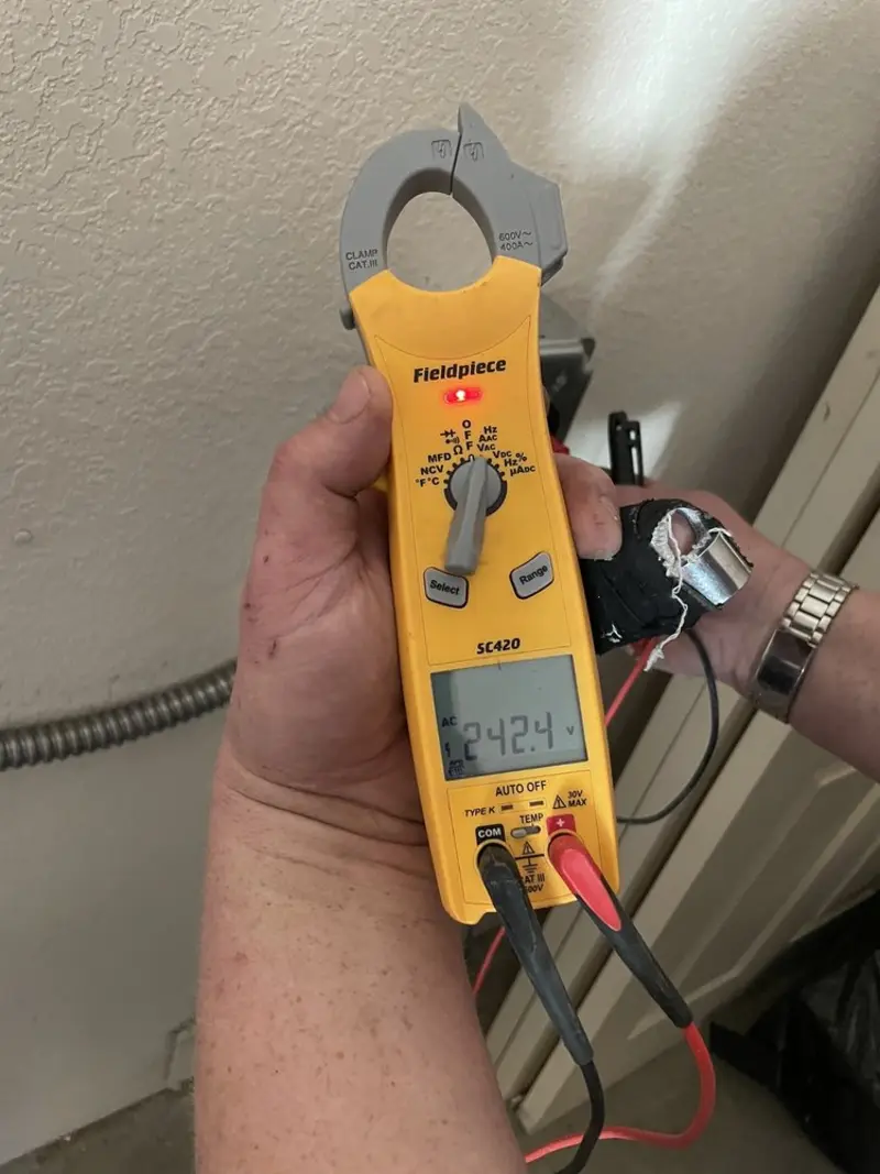Voltage testing with clamp meter during Generator Installation in Canal Fulton
